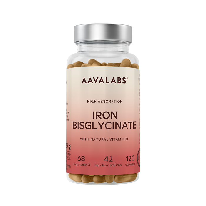 A clear supplement bottle of Aavalabs Iron Bisglycinate capsules with a silver cap and a beige-to-pink label, shown on a plain white background.