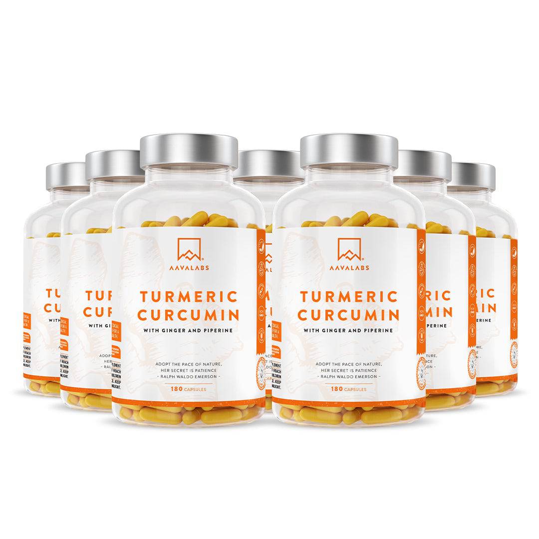 Multiple bottles of AAVALABS Turmeric Curcumin lined up.