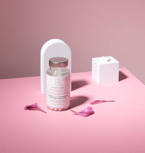 Bottle of Women's Probiolac Probiotic on a pink background  - AAVALABS